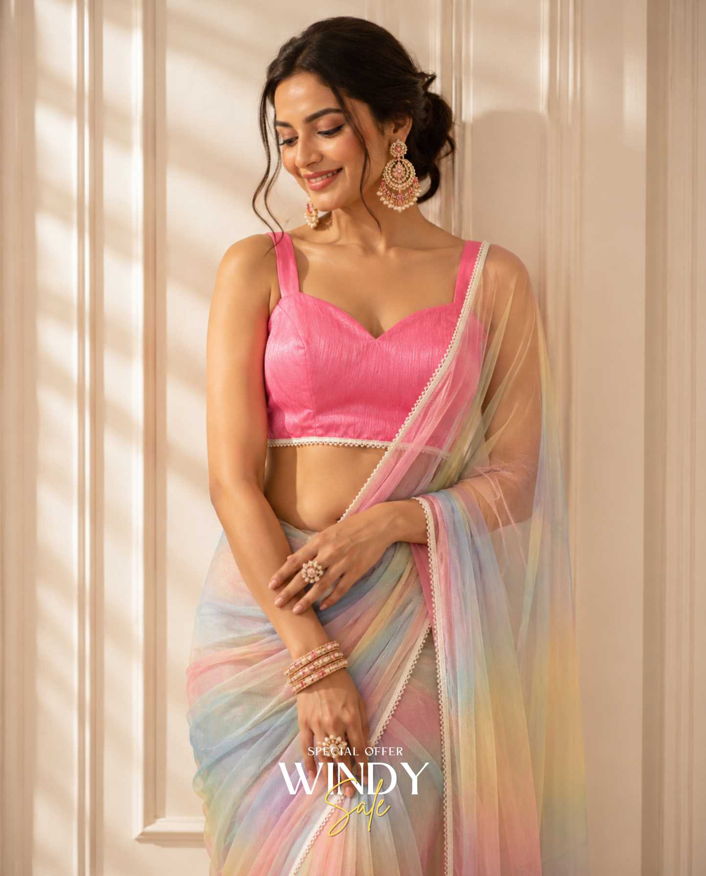 magical Net Rainbow Saree, complete with a perfectly matched jacket.